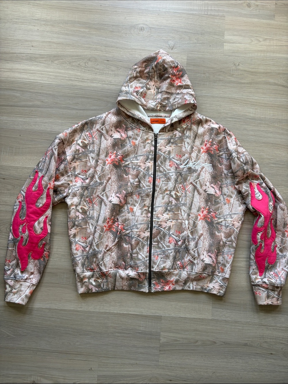 Brand new never worn!!!!!Men’s Pink Camo Zip Hoodie with embroideredFlame Sleeve